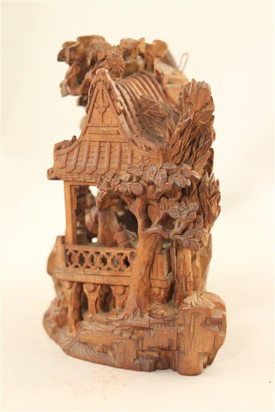 A Chinese hardwood carving of sages, late 19th / early 20th century, 17.5cm., minor losses